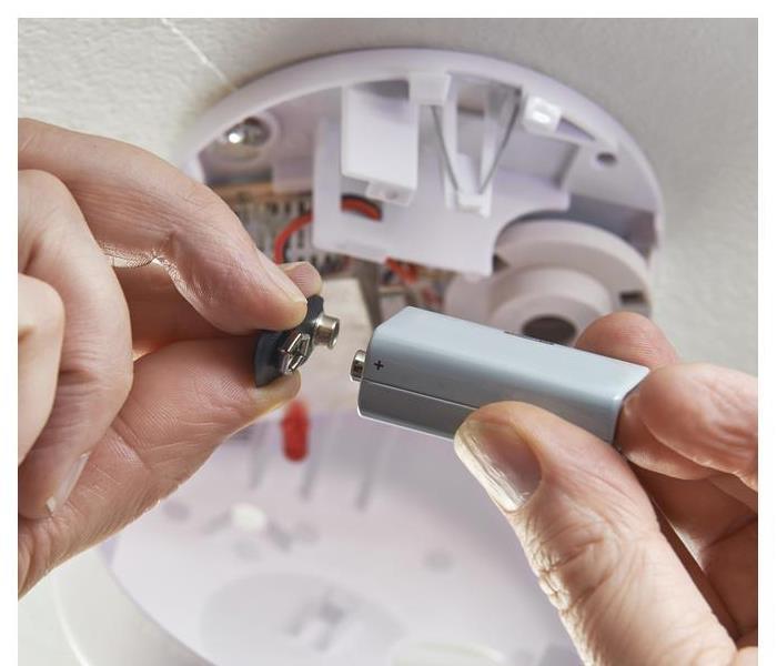 Changing battery to a smoke detector