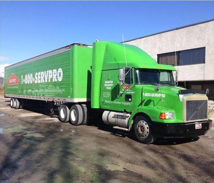 a green SERVPRO Semi truck